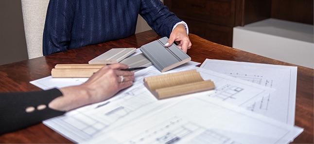 Designer showing wood samples